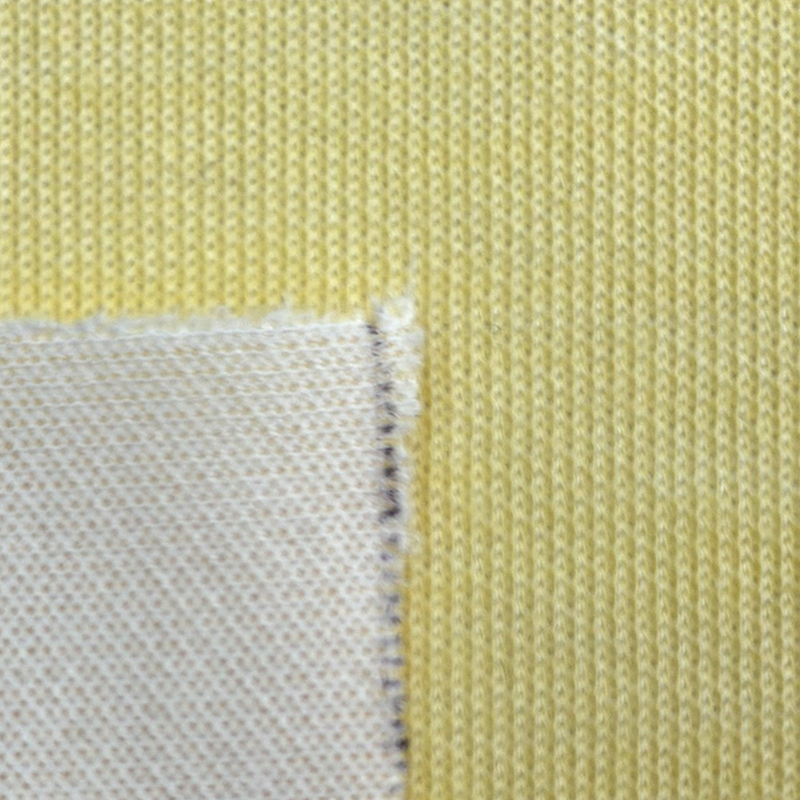 Tissu composite aramide résistant aux coupures