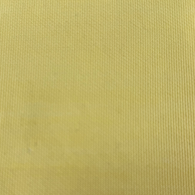 Tissu composite aramide résistant aux coupures